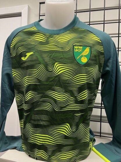 A green sweatshirt with yellow swirls on the front